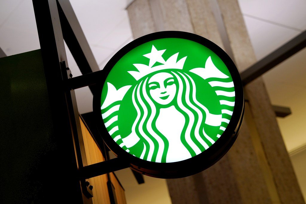 The interior view of a Starbucks shop inside Tampa International Airport, with the prominent green Starbucks logo, photo made on August 2024.